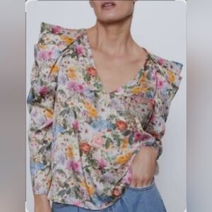 Zara floral print blouse with puff sleeves and a V-neckline